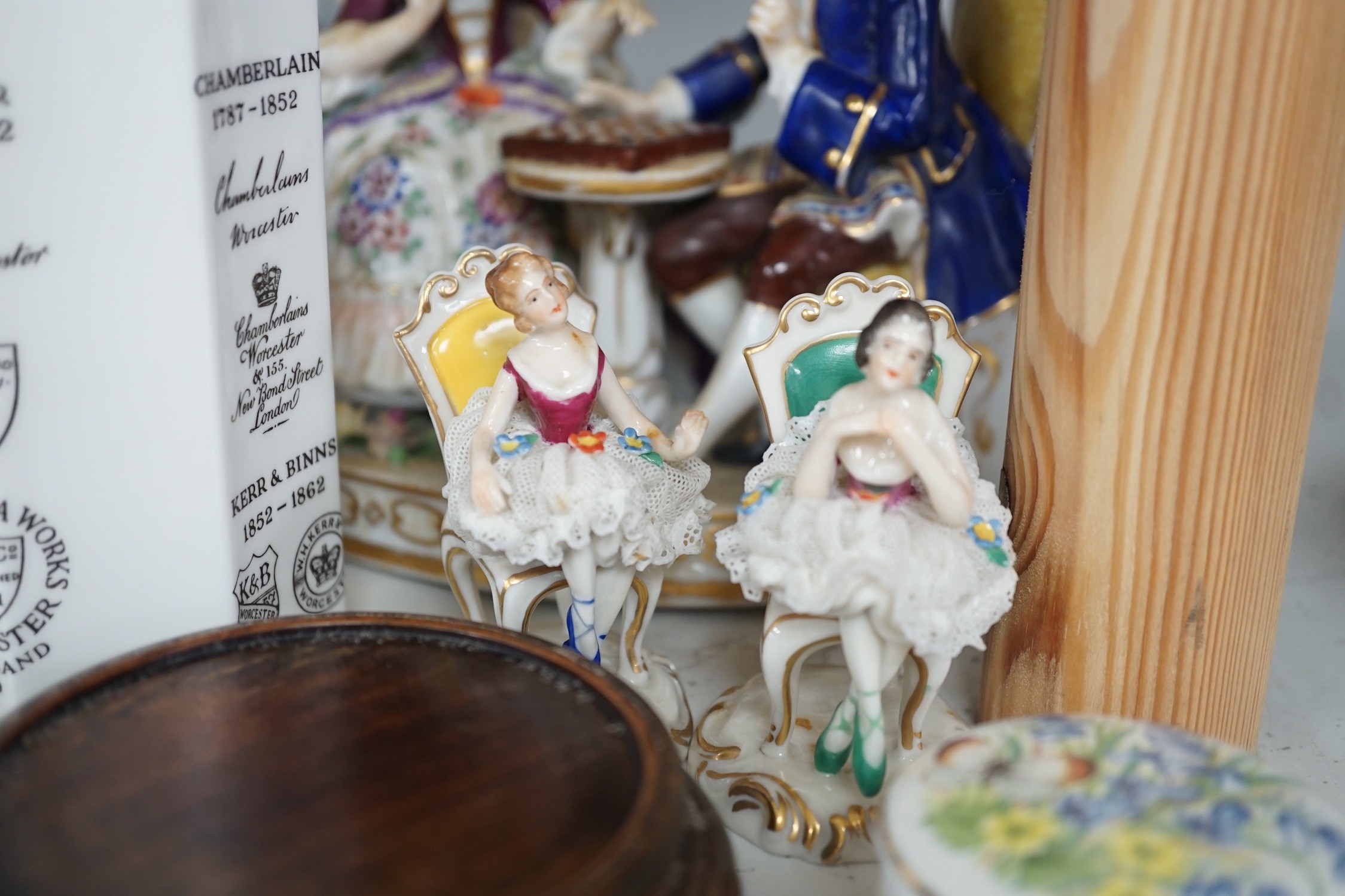 Two Meissen leaf dishes, a Dresden plate, two group figures and mixed ceramics, tallest 25cms high